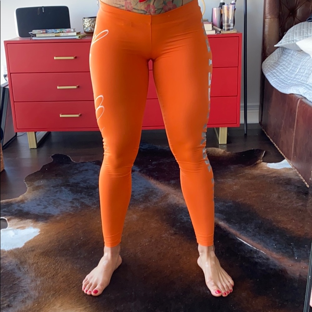 Cute orange Labellamafia legging with silver logo